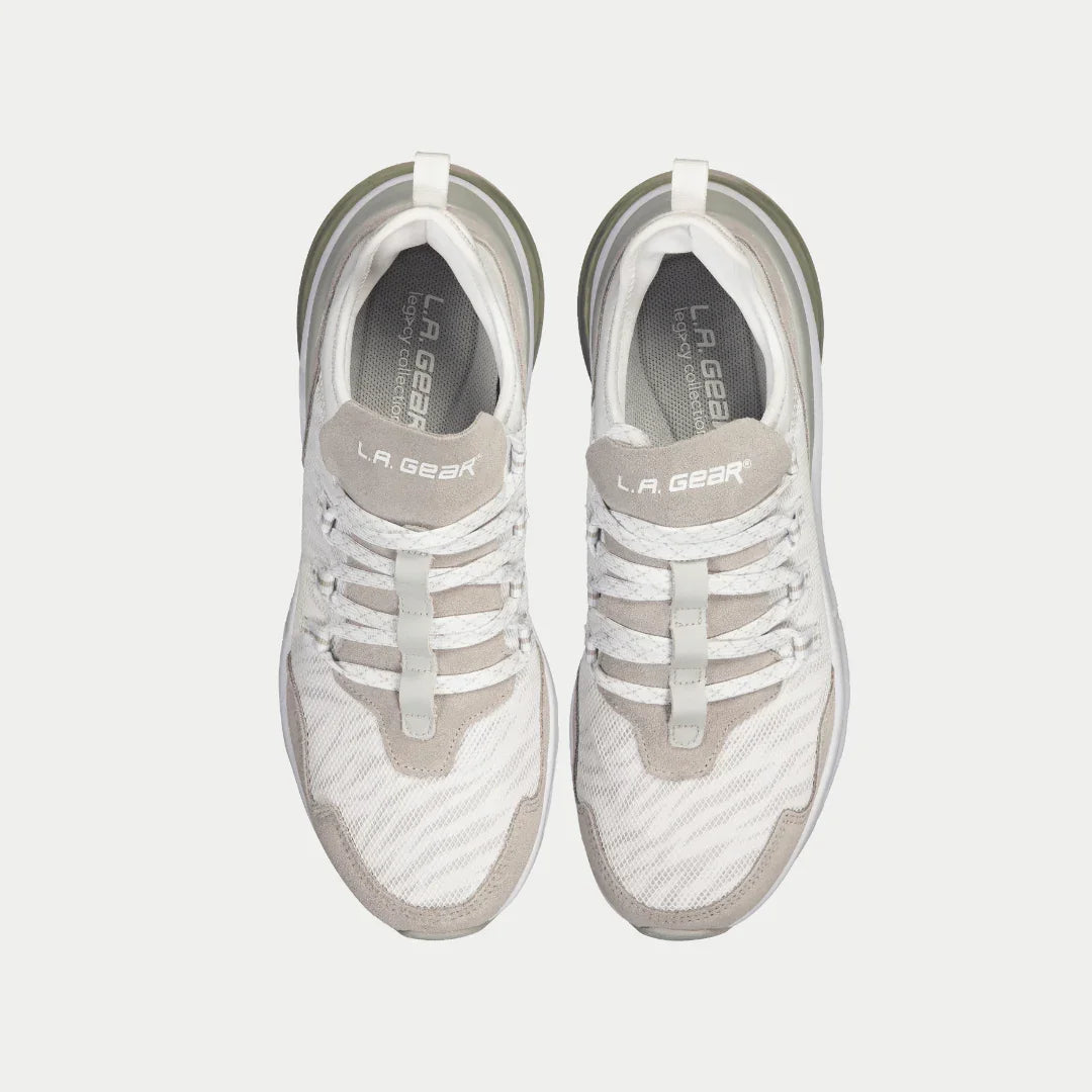 White and gray lace-up lowtop sneakers with LA Gear logo on inner tongue