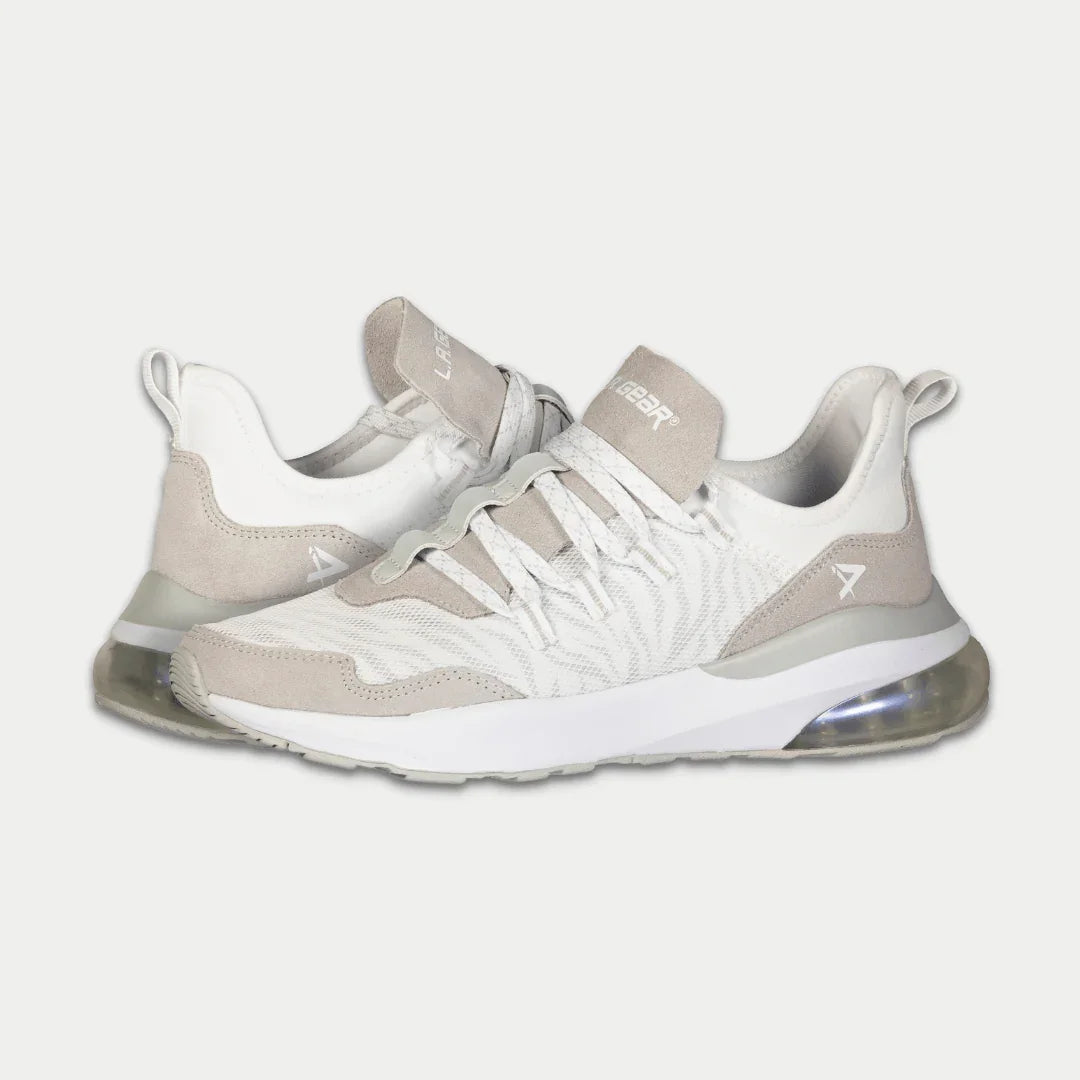 White and gray lowtop sneakers with lace-up closure and cushioned air sole