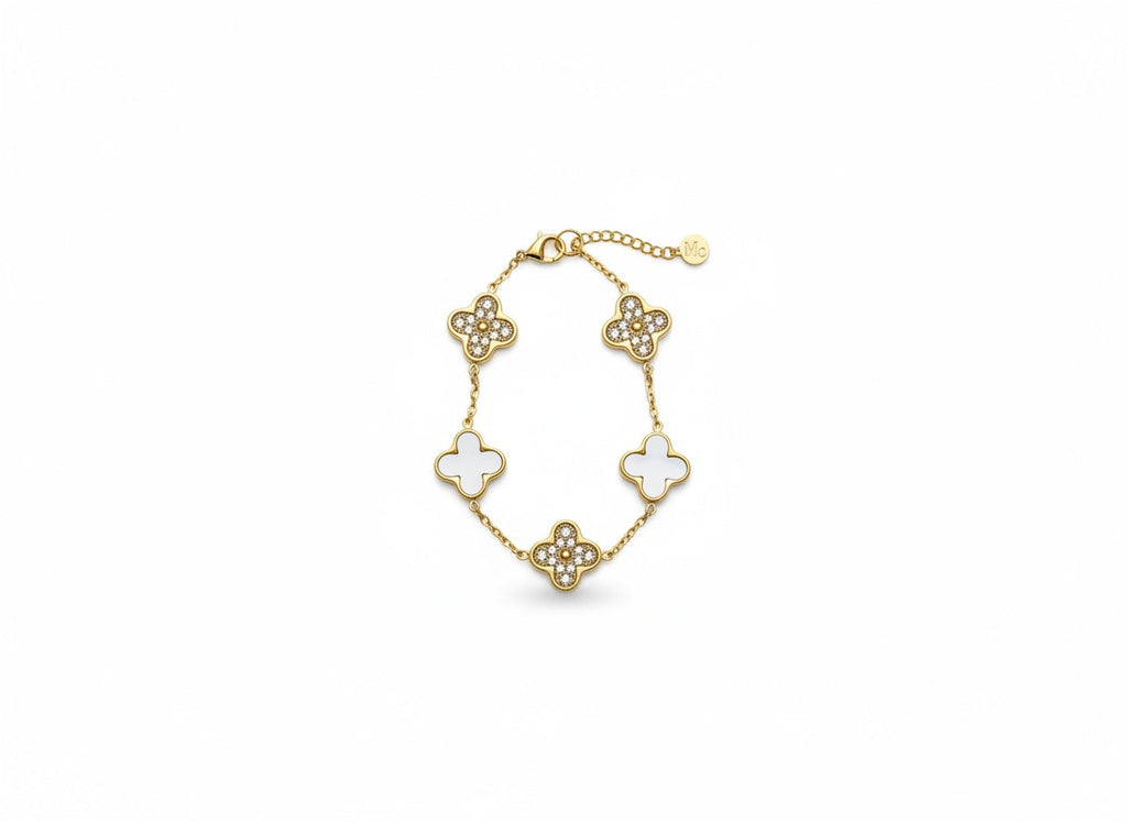 Gold-tone charm bracelet with cross and clover charms
