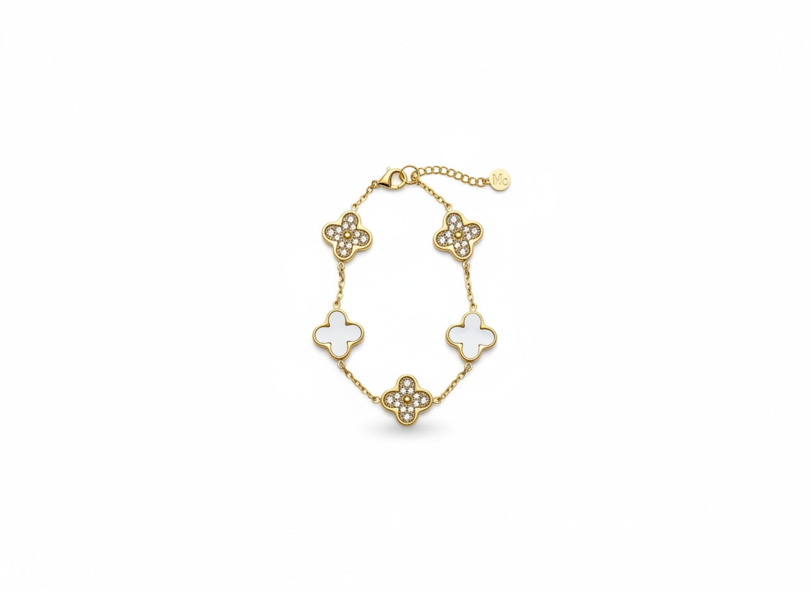 Gold-tone charm bracelet with cross and clover charms