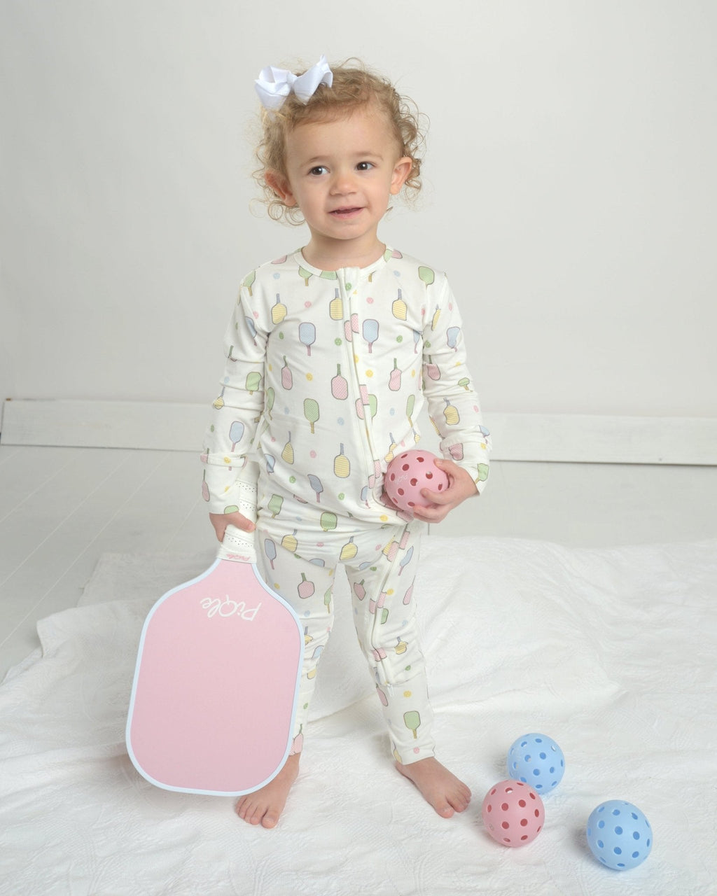 Toddler footed pajama romper, white with multicolor popsicle pattern