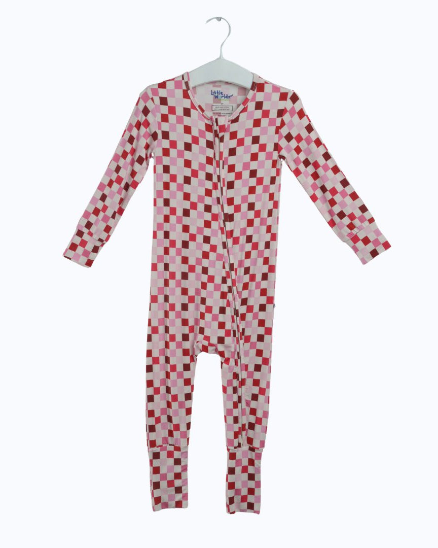 Pink and red checkered toddler pajama romper on hanger, front view