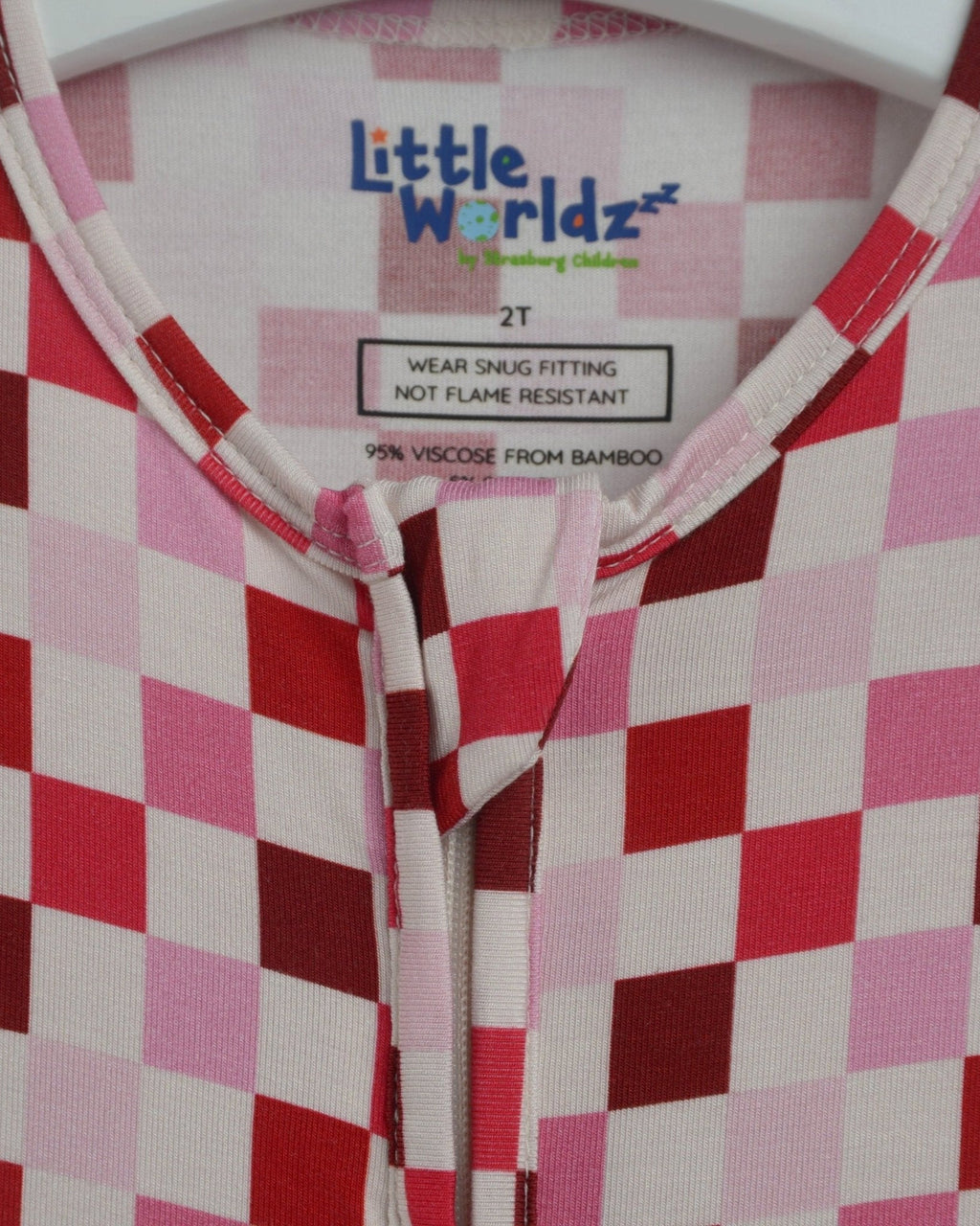 Pink, red, and white checkered toddler pajama romper neckline with zipper placket