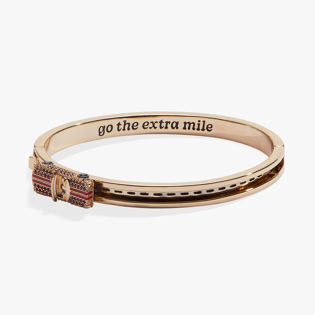 Gold-tone car fidget bangle with pink crystal clasp detail