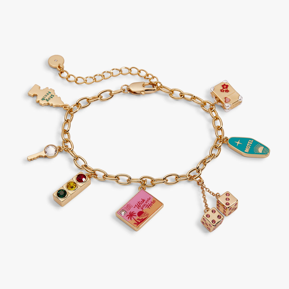 Gold-toned chain bracelet with multiple travel-themed charm dangles