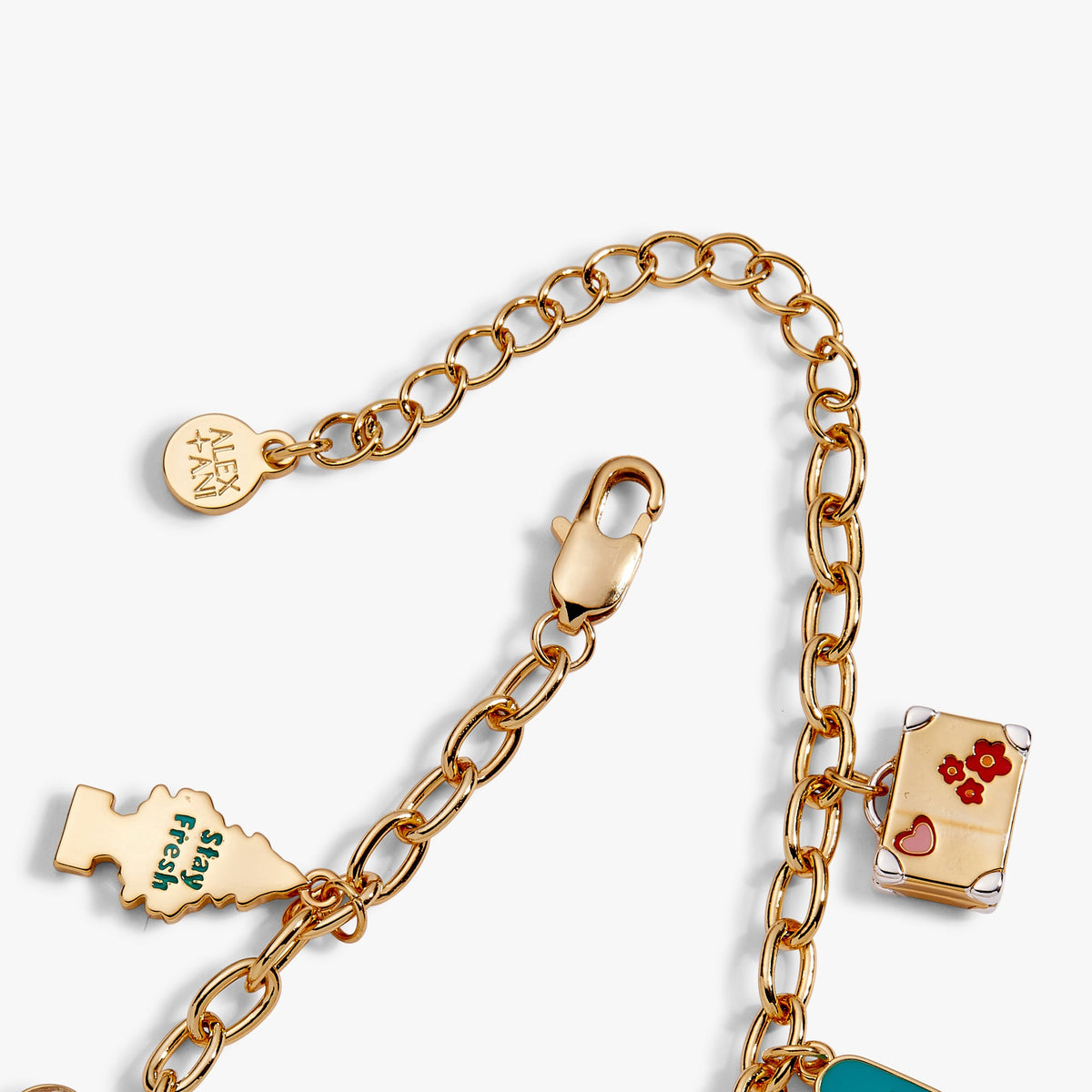Gold-toned charm bracelet with padlock and travel map-style charm elements