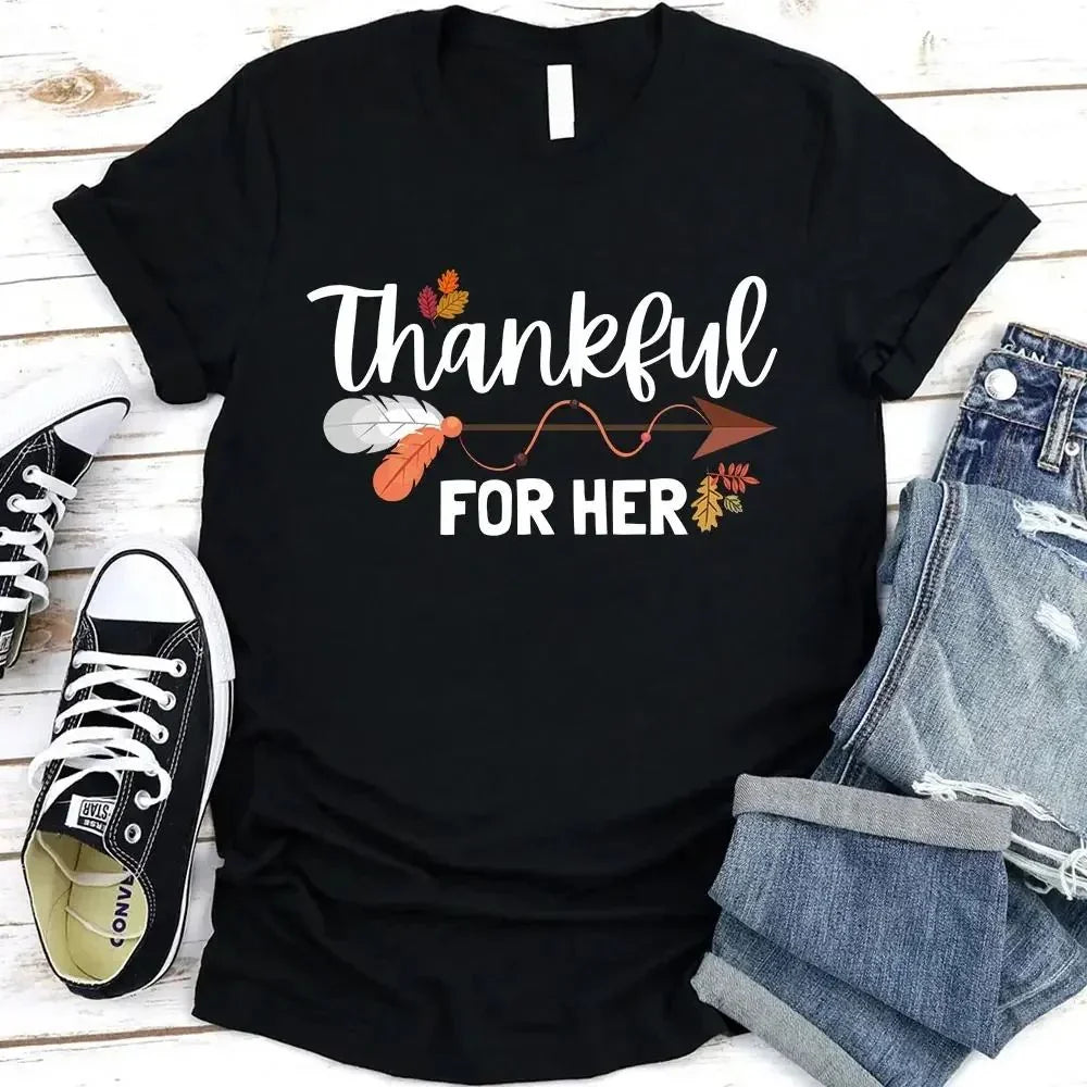 Black T-shirt with “Thankful for Her” fall-themed graphic