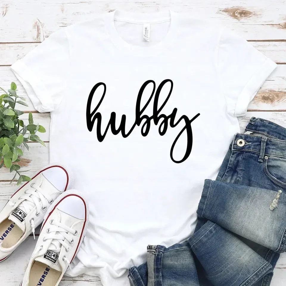 White unisex couple tee with “hubby” script print on the chest