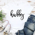 White unisex couple tee with “hubby” script print on the chest