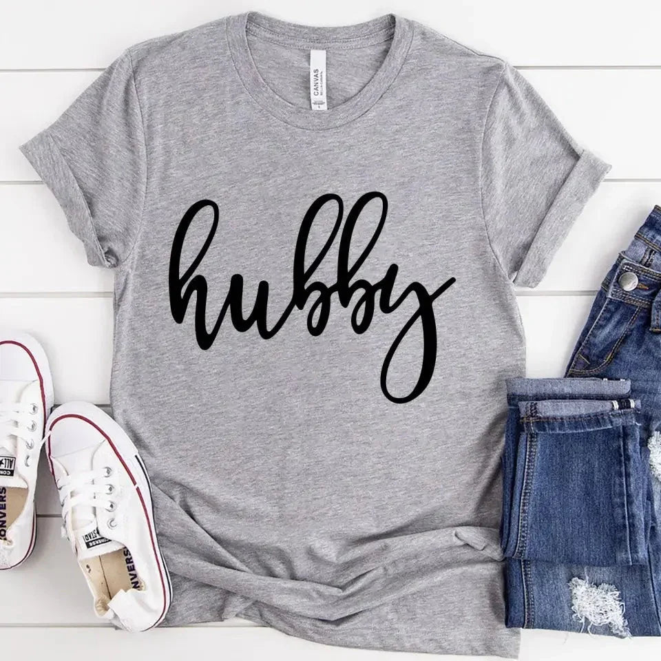 Heather gray unisex couple tee with “hubby” script print across the chest