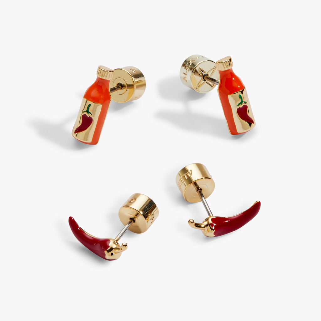 Gold-tone stud earrings featuring red chili peppers and hot sauce bottles