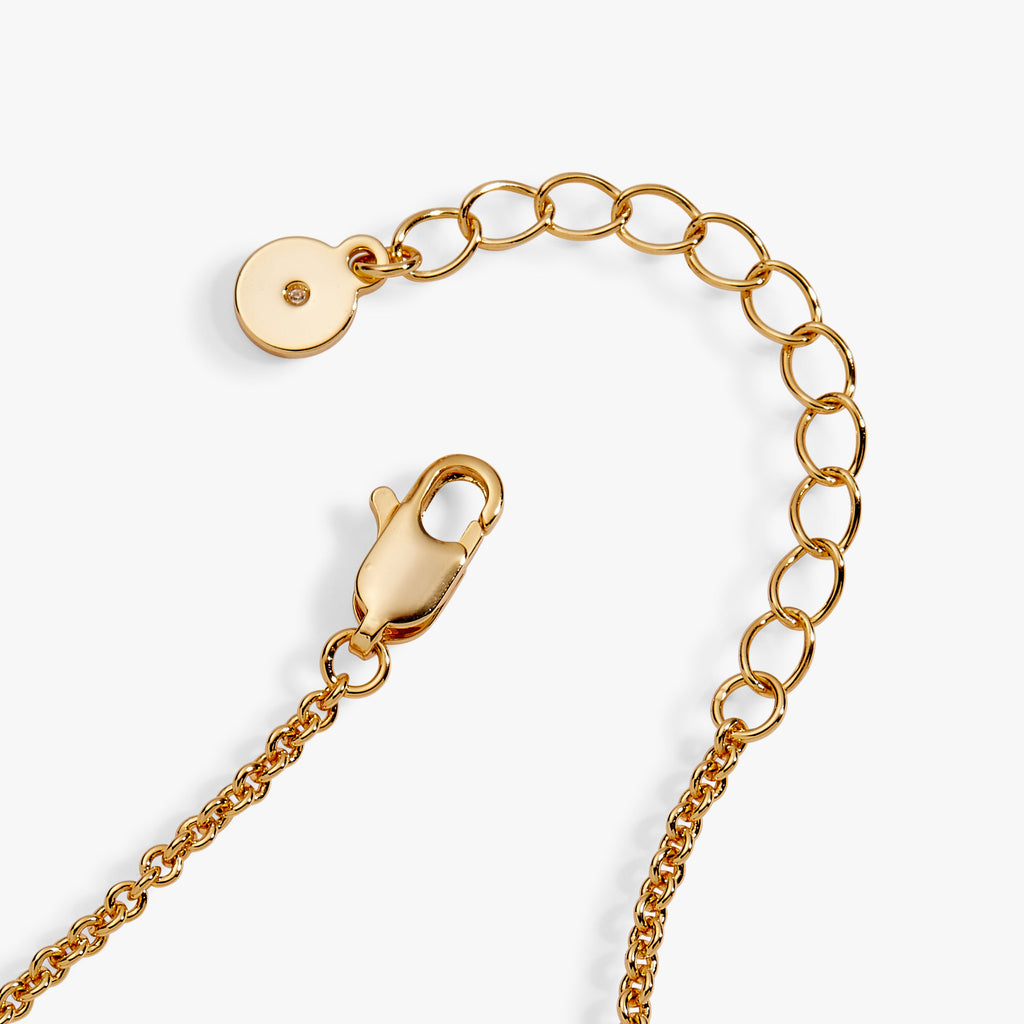 Gold-tone bracelet clasp and links with small round ID charm