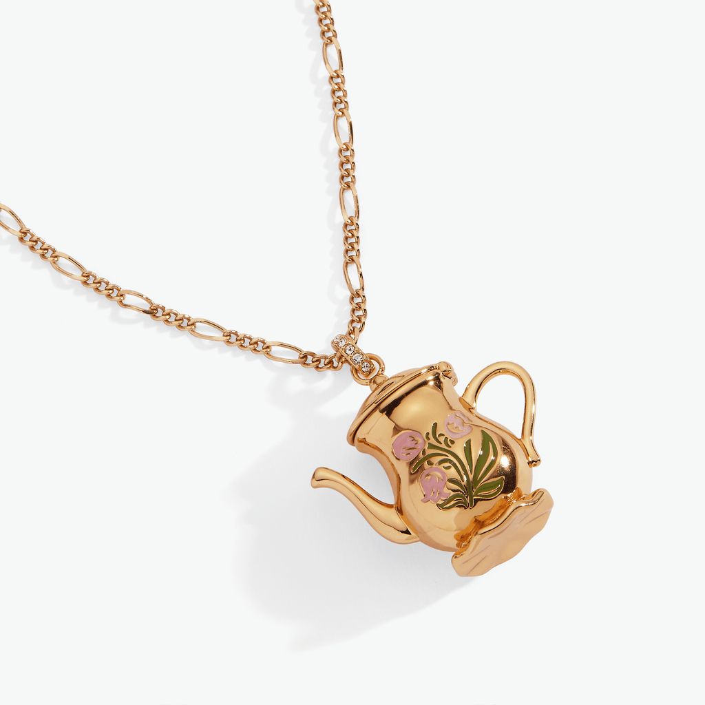 Gold-tone teapot locket pendant on chain, side view