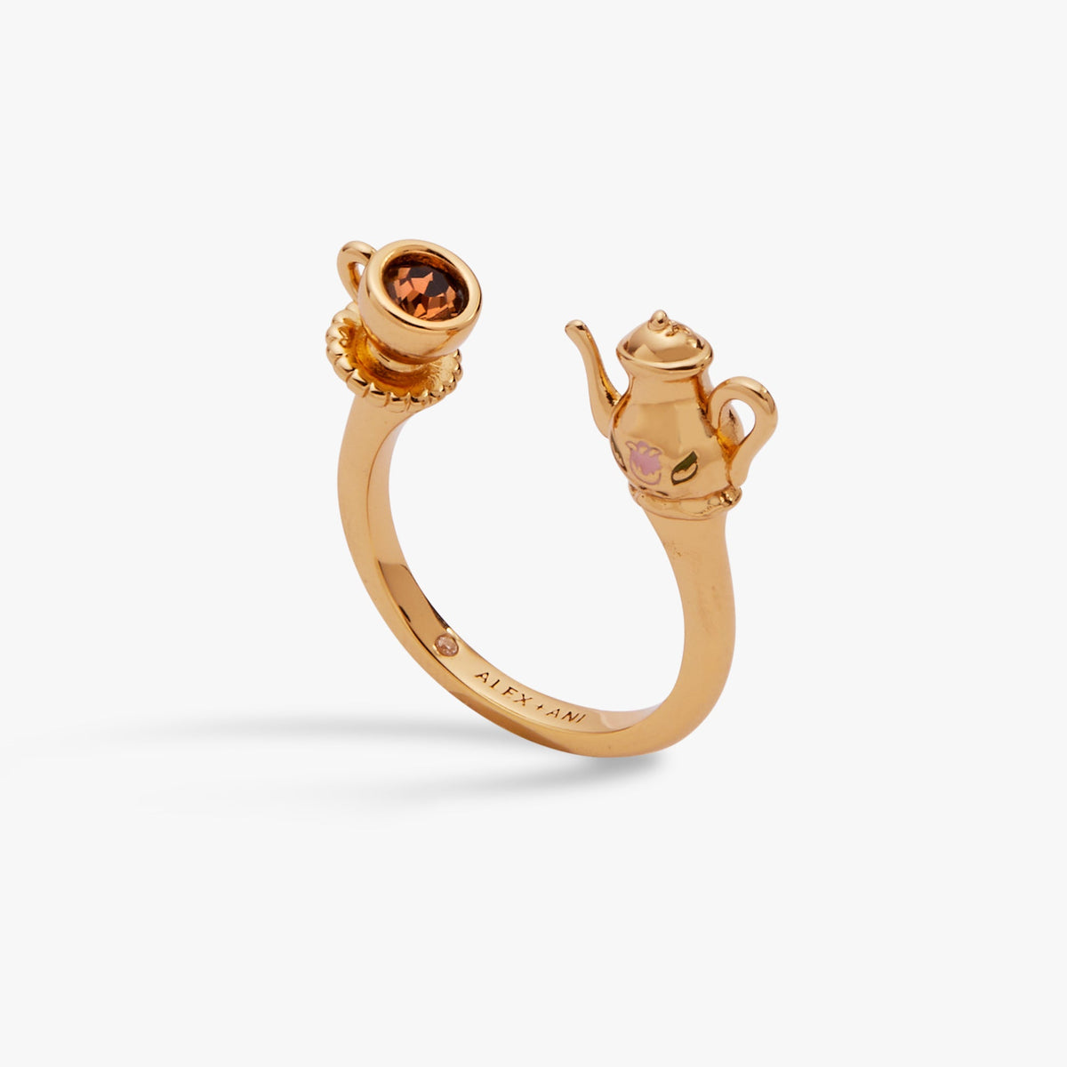 Gold-tone ring with teapot and cup charms and a round gemstone accent