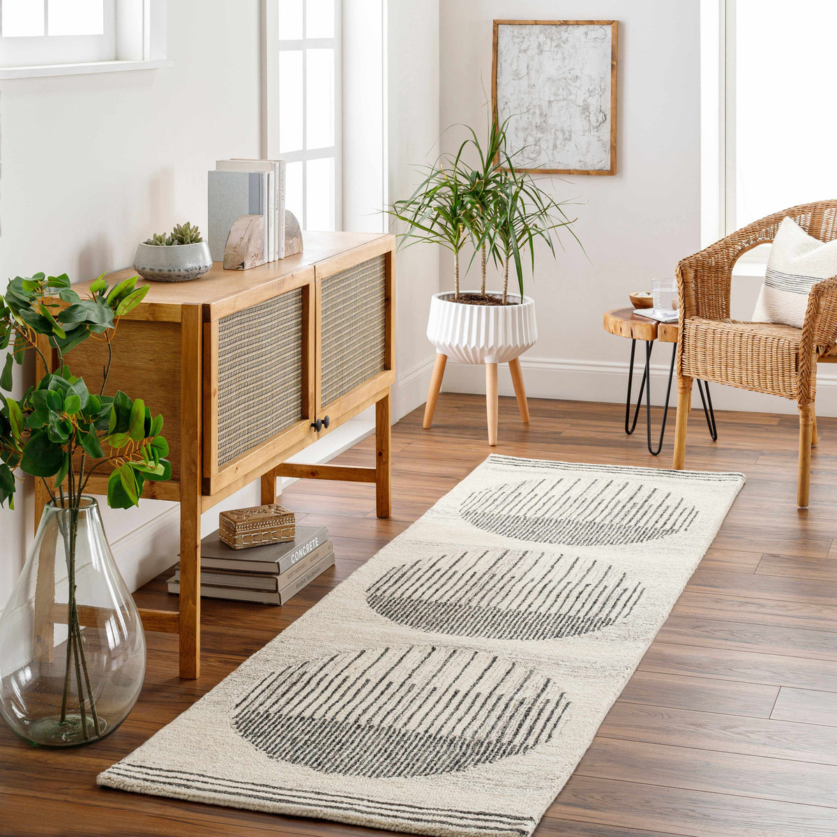 Runner rug, cream with charcoal striped U-shaped medallions and dark border edges
