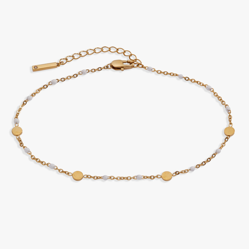 Gold chain anklet with round coin charms and white enamel station links